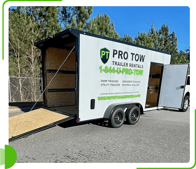 A white enclosed trailer with Pro Tow Trailer Rentals branding parked outdoors.